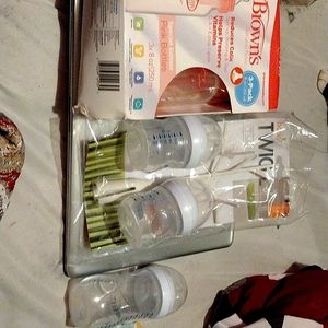 Dr brown's natural flow 3- pack plus 3 Avent bottles and a twig drying rack